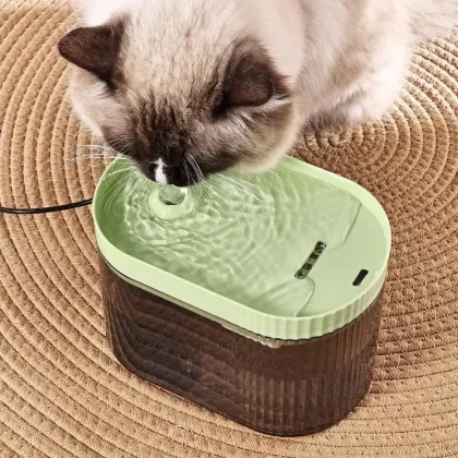 Buy Pet Drinking Fountain Automatic 2L for cats and small to medium dogs. Features USB & adapter power supply, activated carbon filter, low noise, and a stylish design.