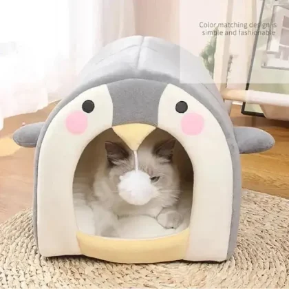 Keep your cat warm and cozy with the Penguin Face Igloo Pet House. Made from soft plush fabric, it offers comfort, warmth, and security for cats and small pets.